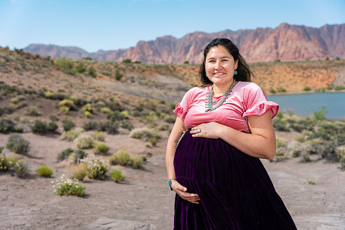 Pregnant Native women in traditional regalia