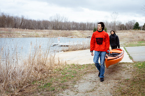 Indigenous family going kayaking