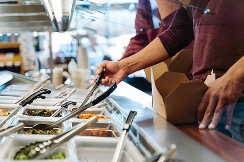 Indigenous man getting food