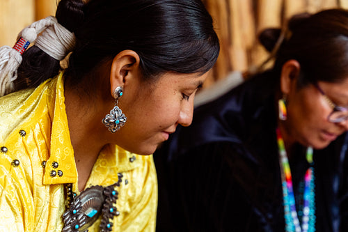 Native Women grinding corn