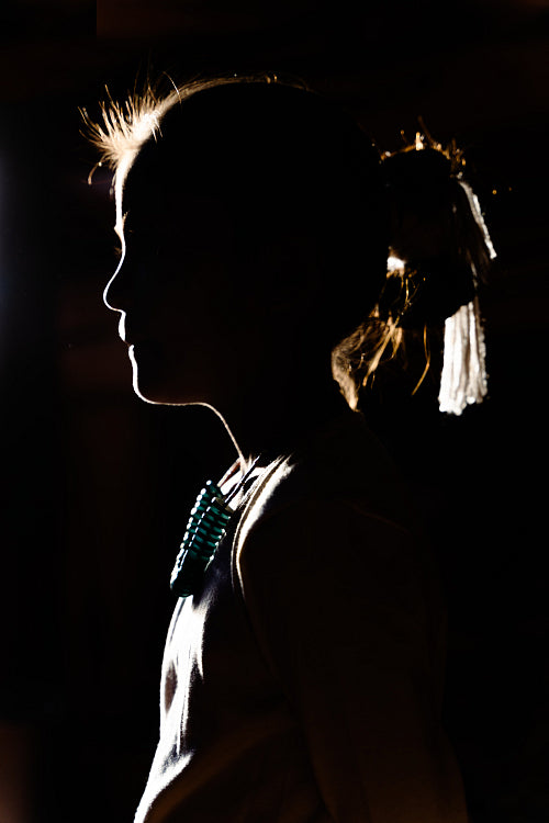 Native American children wearing traditional regalia