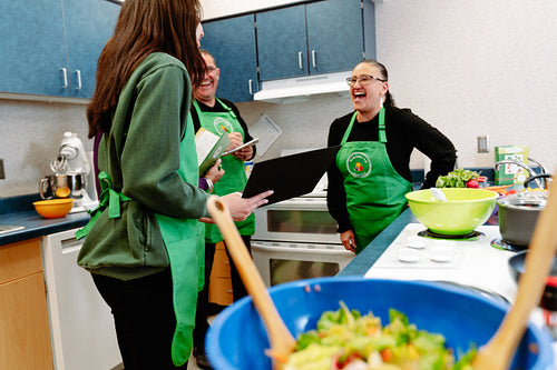 Indigenous Peoples making a meal together