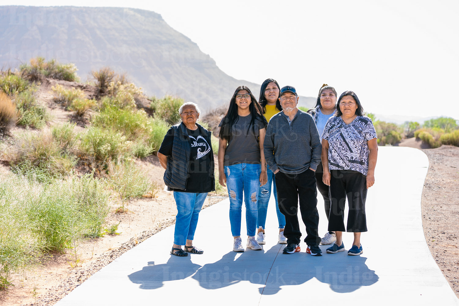 A Native family walking together