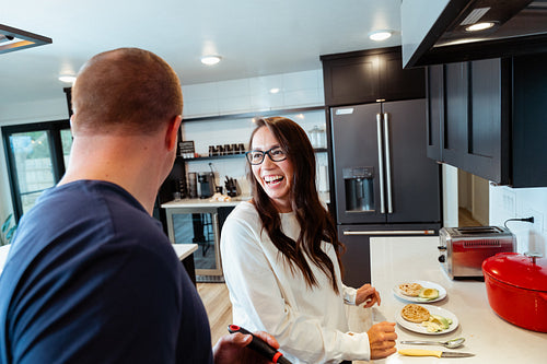 A couple cooking a meal together