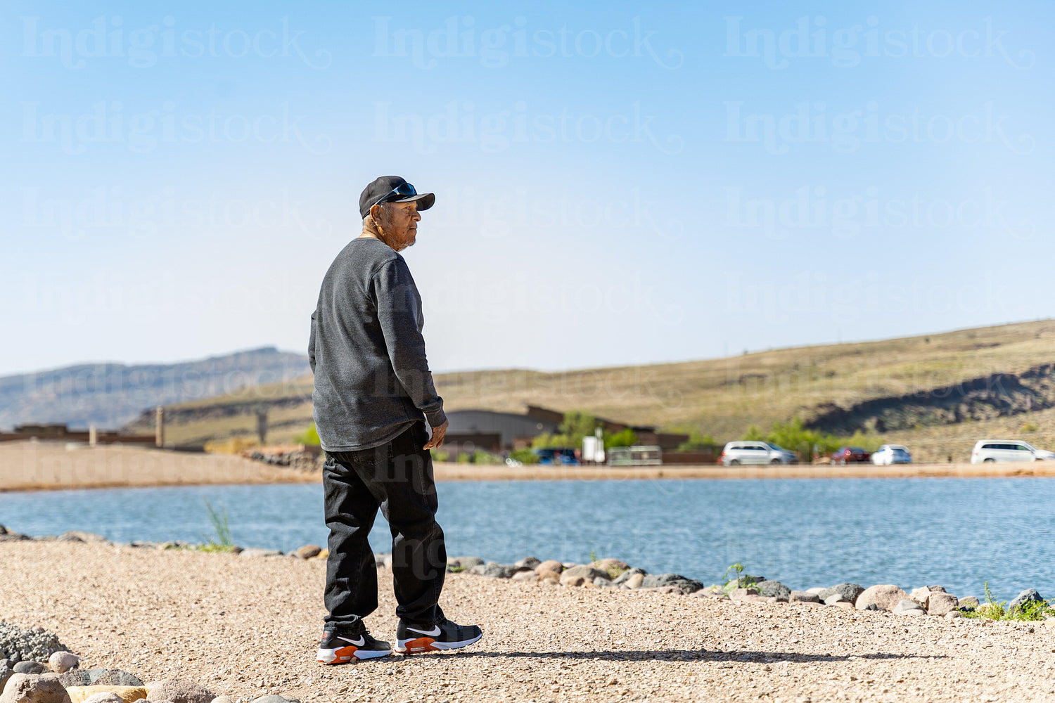 Native Elder enjoying a walk by a lake