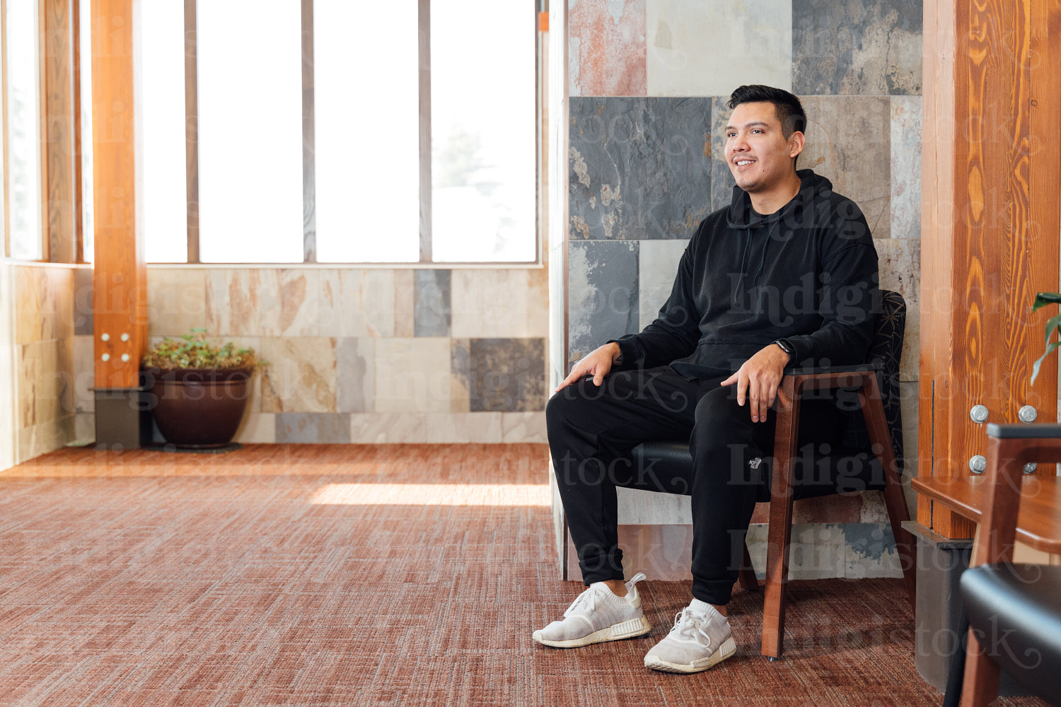 Indigenous man waiting in clinic