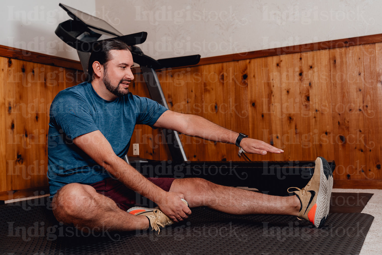 Indigenous Men working out in home gym