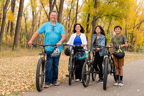 Native family going on a bike ride