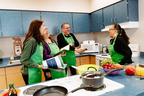 Indigenous Peoples making a meal together