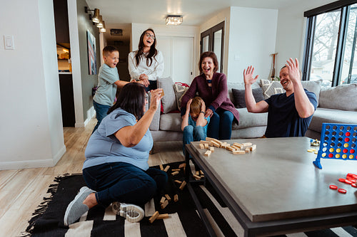 A family of Indigenous Peoples playing games together