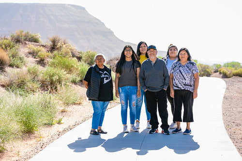 A Native family walking together