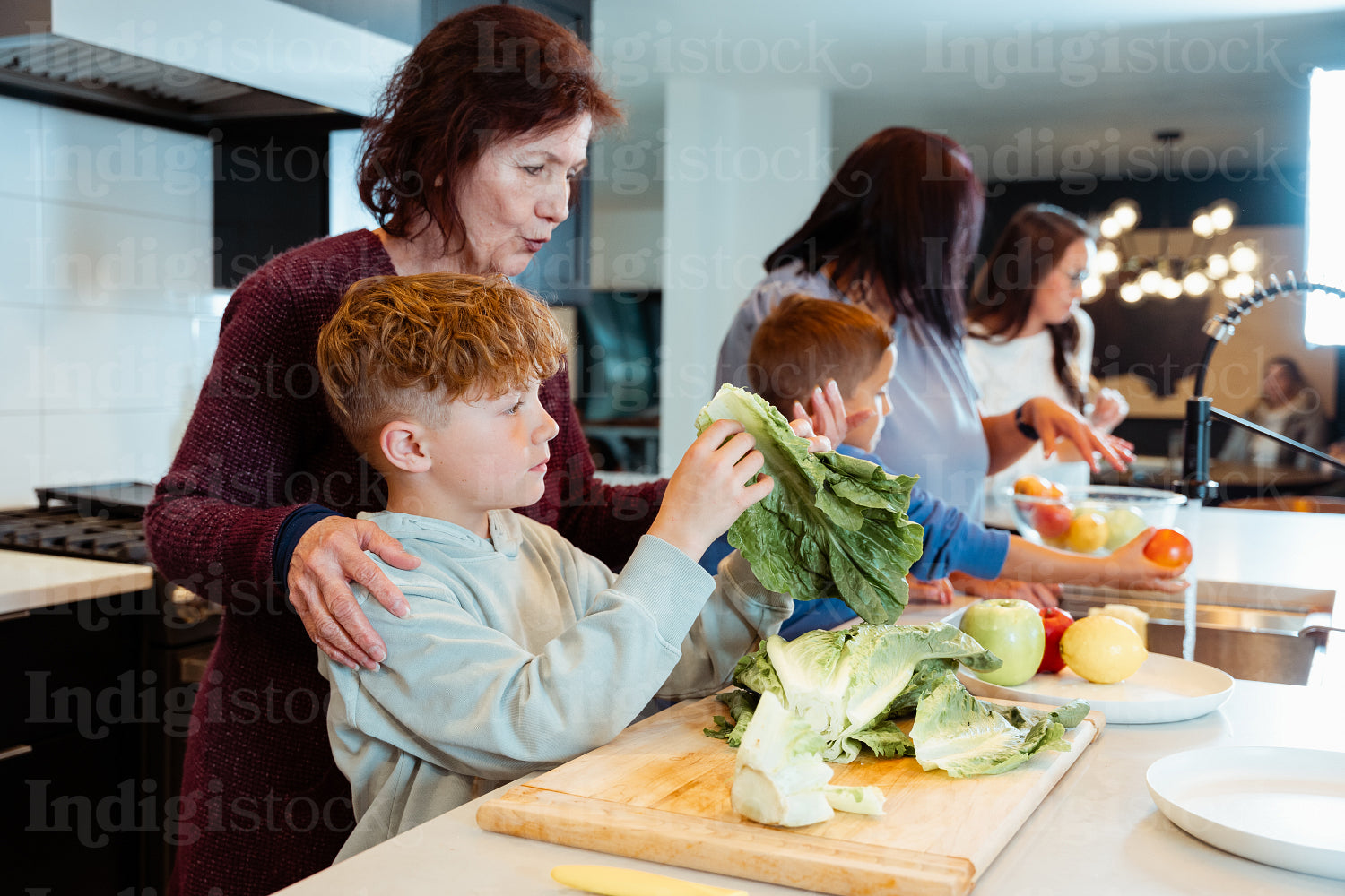 A Native family is preparing a meal together