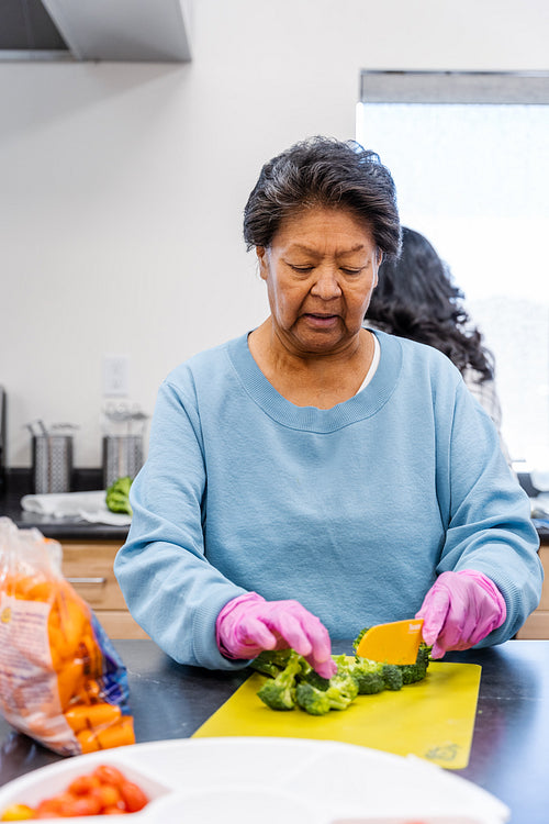 Native Peoples participating in a cooking class