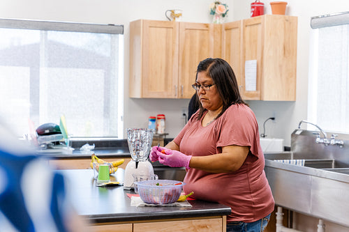 Native Peoples participating in a cooking class