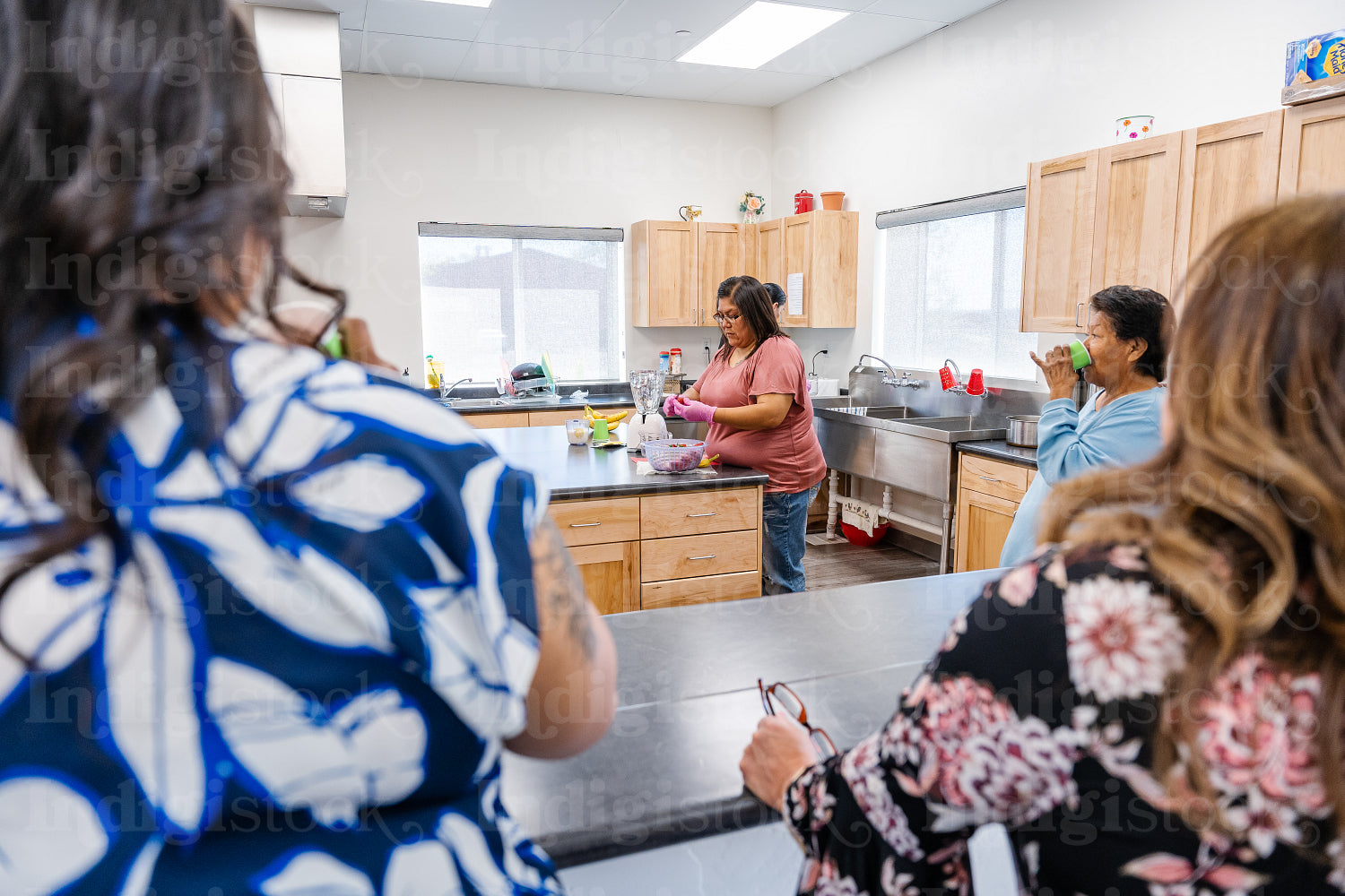 A native teacher instructing a class about health and wellness