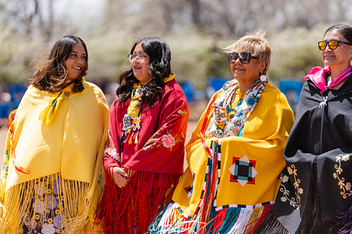 Indigenous Peoples wearing traditional Regalia