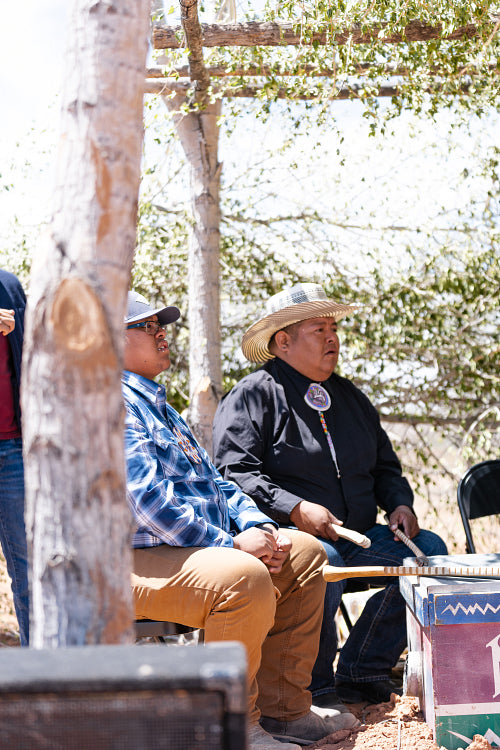 Indigenous Elders watching a Native dance