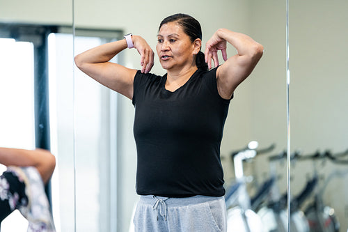 Native woman learning from an instructor