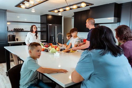 A Native family is preparing a meal together