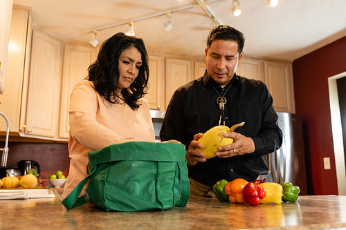 Indigenous couple preparing dinner