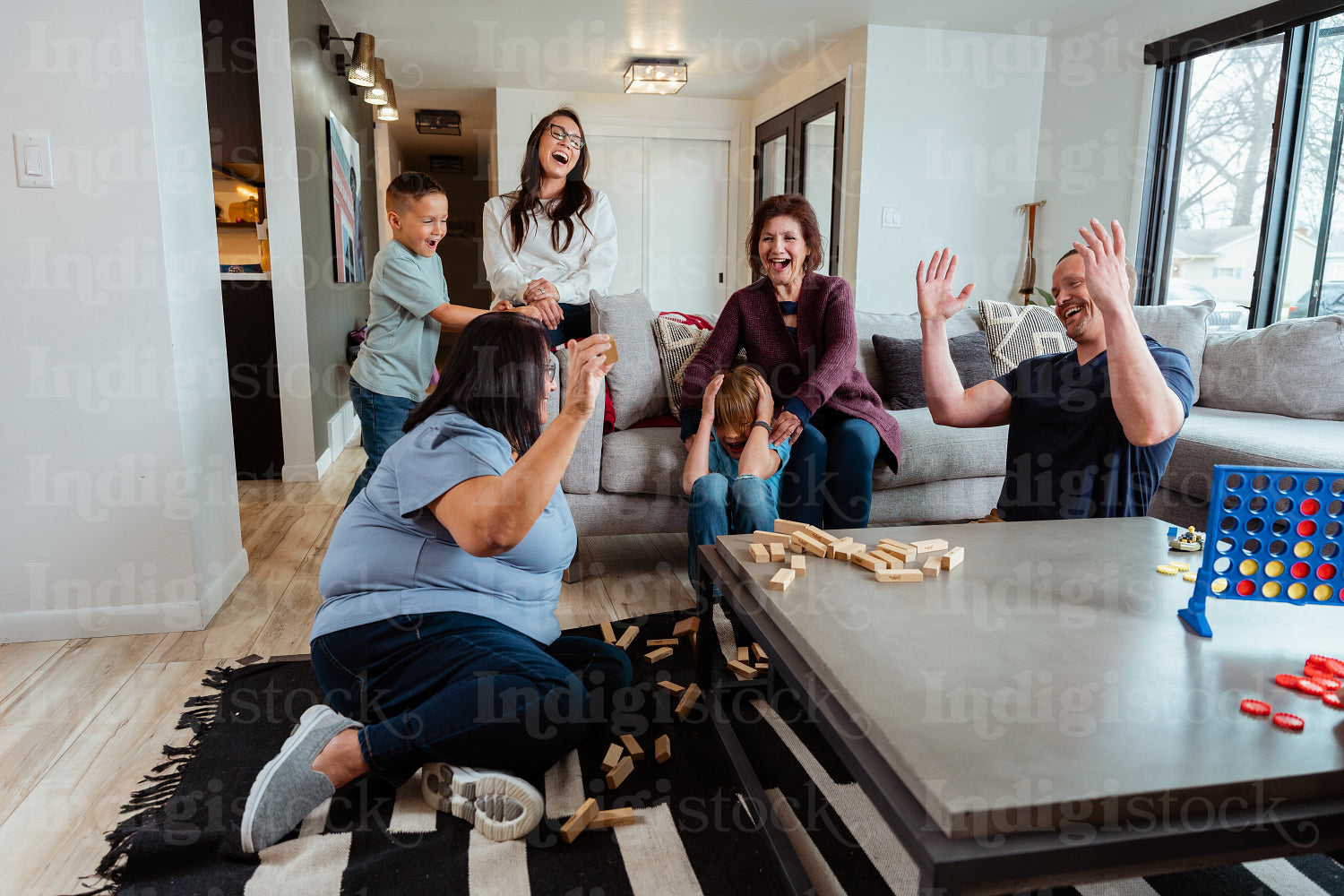 A family of Indigenous Peoples playing games together