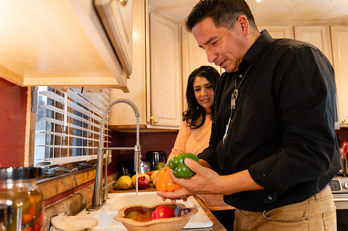 Indigenous family making a meal together