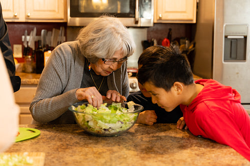 Indigenous family making a meal together