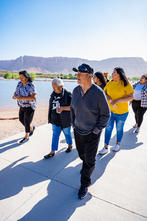 A Native family walking together