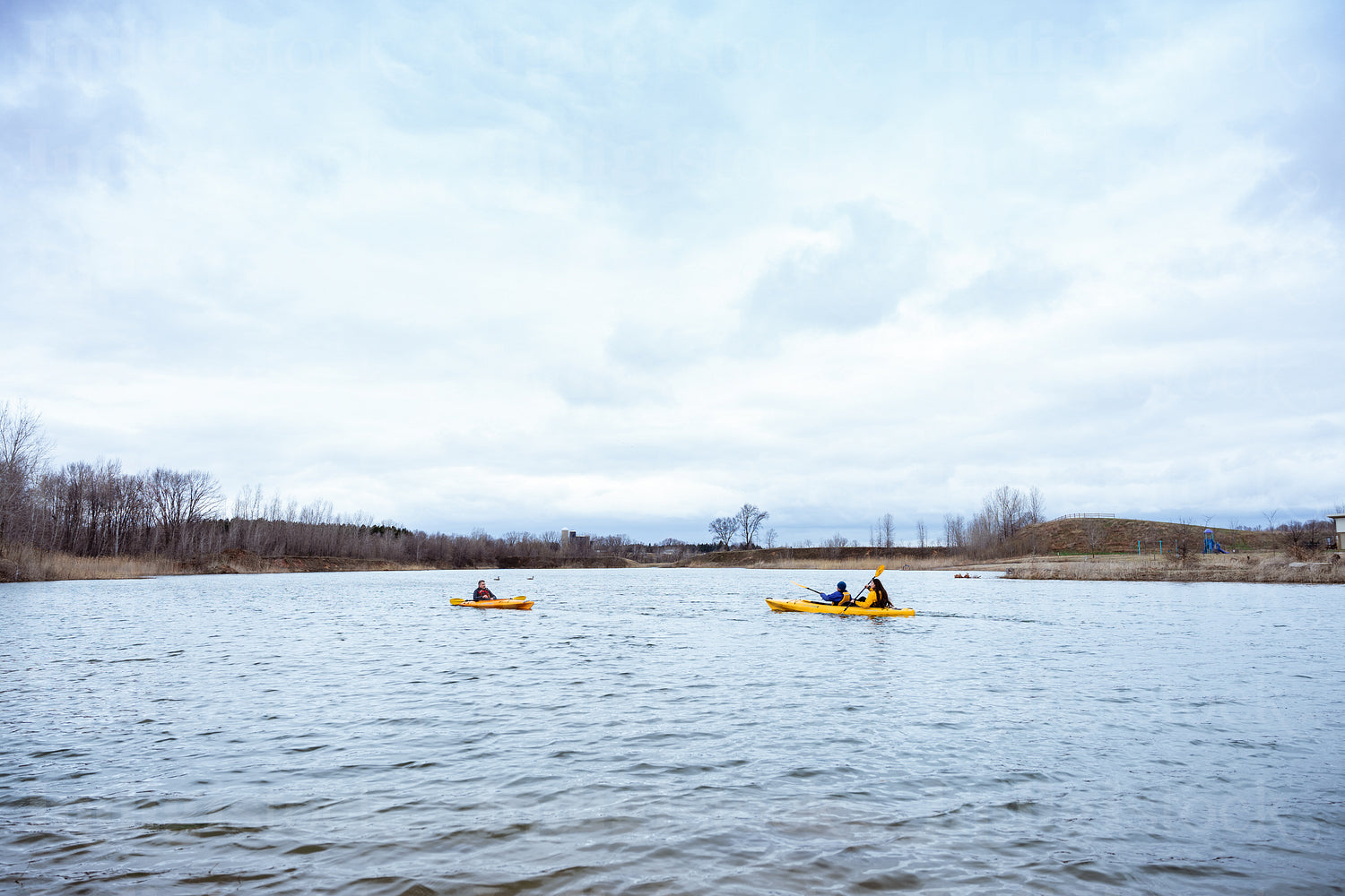 Indigenous family going kayaking 