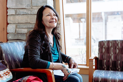 Indigenous woman waiting in a clinic