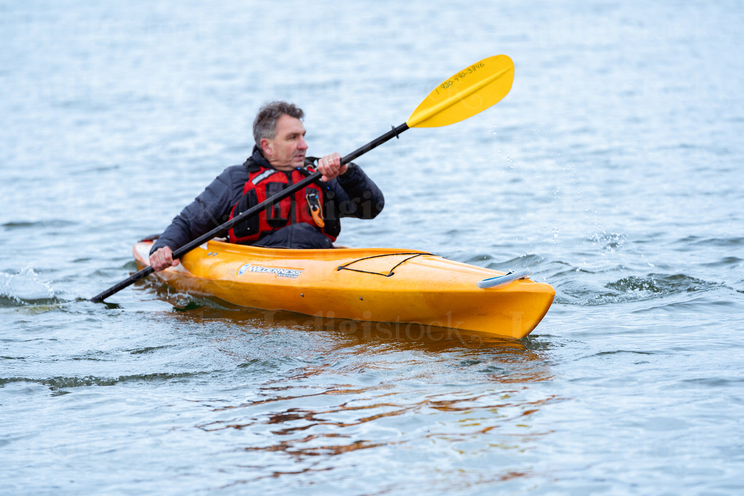 Indigenous family going kayaking 