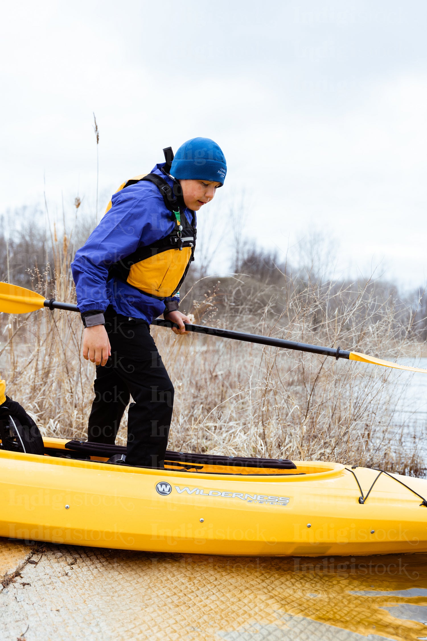 Indigenous family going kayaking 