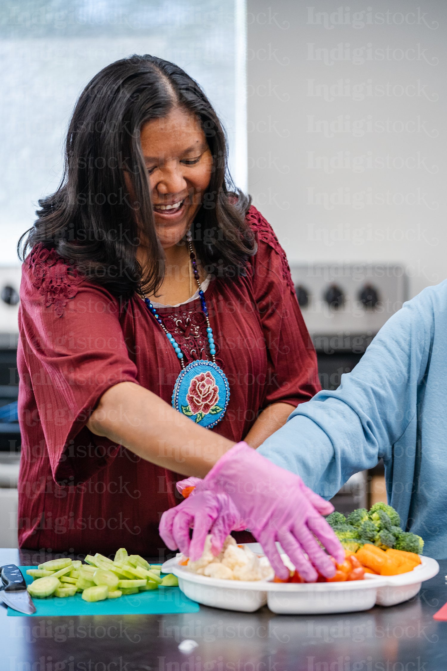 Native Peoples participating in a cooking class