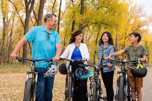 Native family going on a bike ride