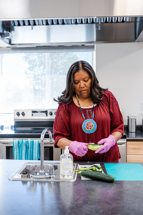 Native Peoples participating in a cooking class