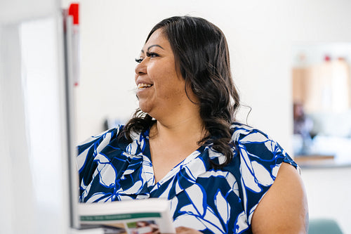 A native teacher instructing a class about health and wellness