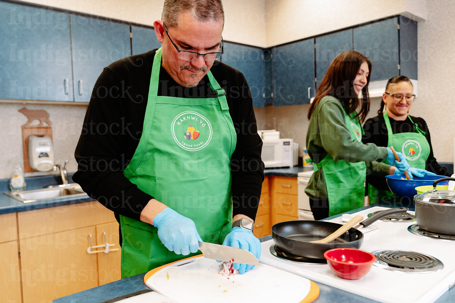 Indigenous Peoples making a meal together