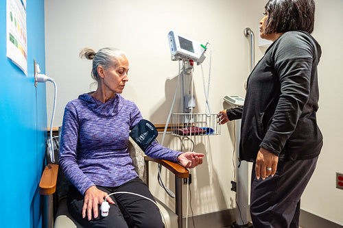 A native elder getting a health checkup at a health center