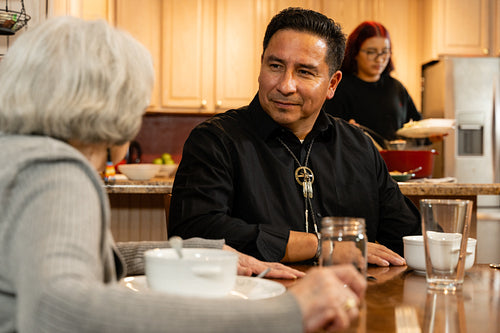 Indigenous family sharing a meal