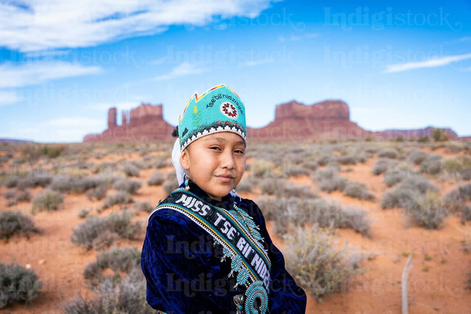 Native youth wearing traditional clothing and regalia 