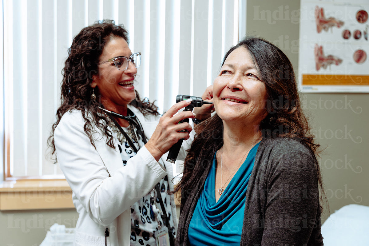 First Inuit Female Doctor Indigenous woman visiting the doctor – indigistock