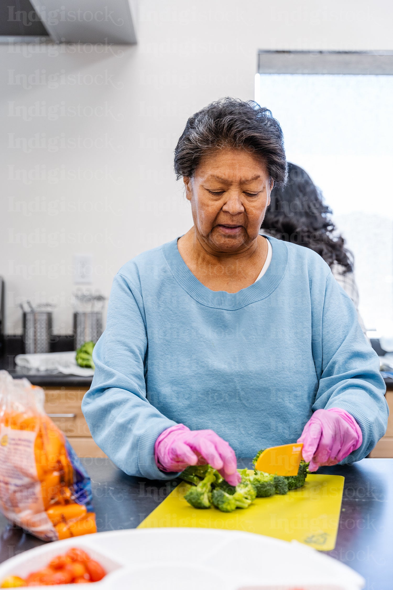 Native Peoples participating in a cooking class