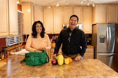 Indigenous couple preparing dinner