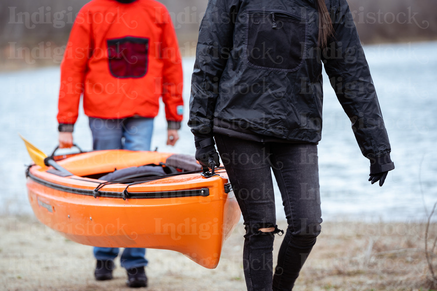 Indigenous family going kayaking 