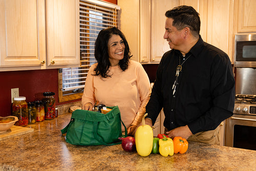 Indigenous couple preparing dinner