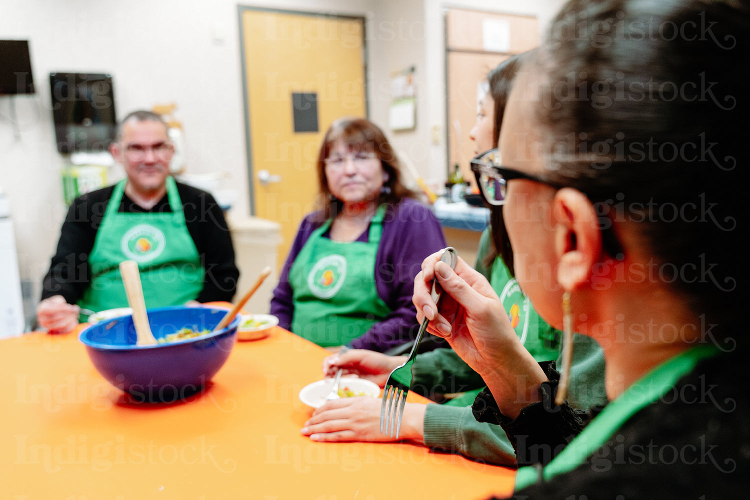 Indigenous Peoples sharing a meal together