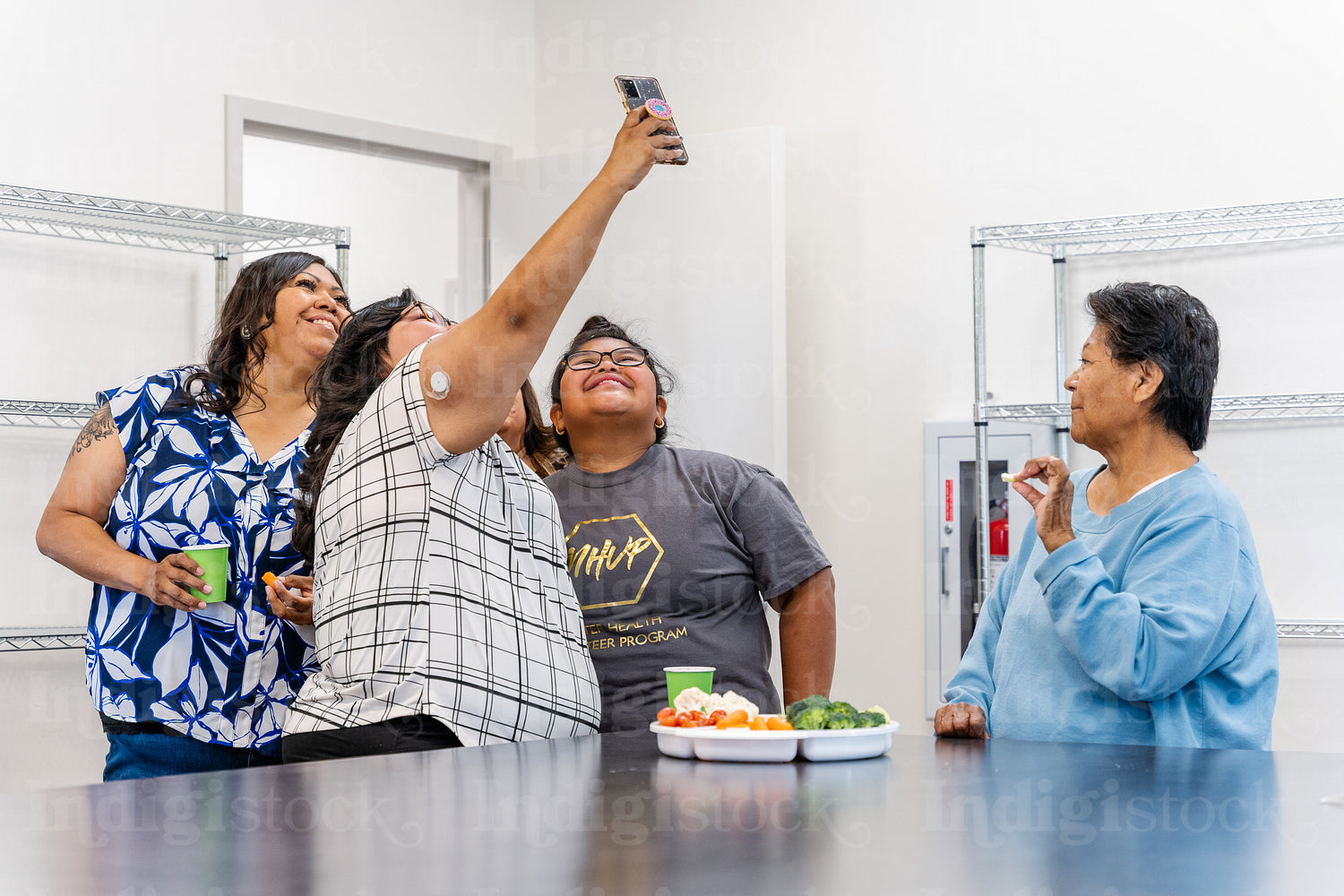 Native Peoples participating in a cooking class