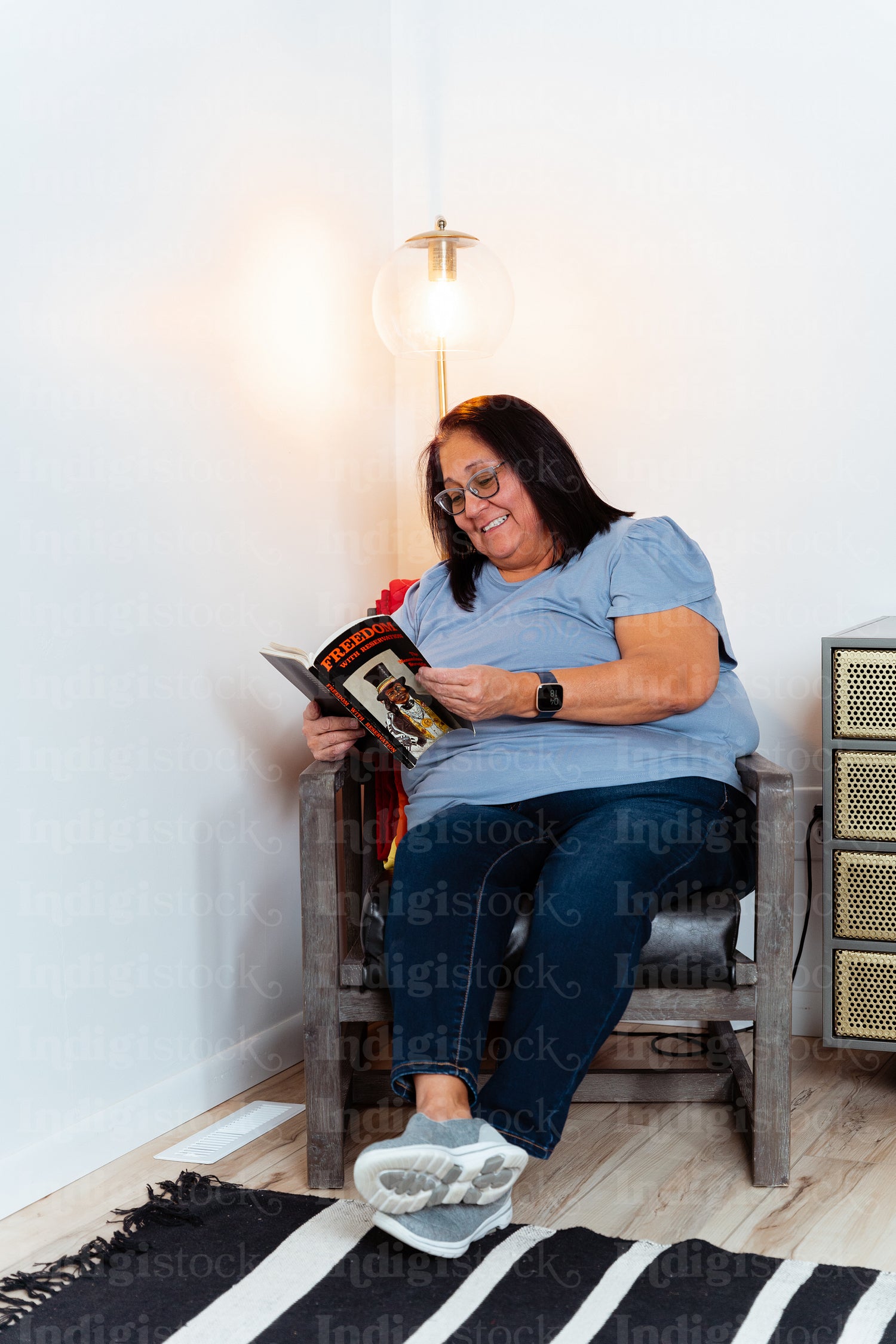 An elder reading a book