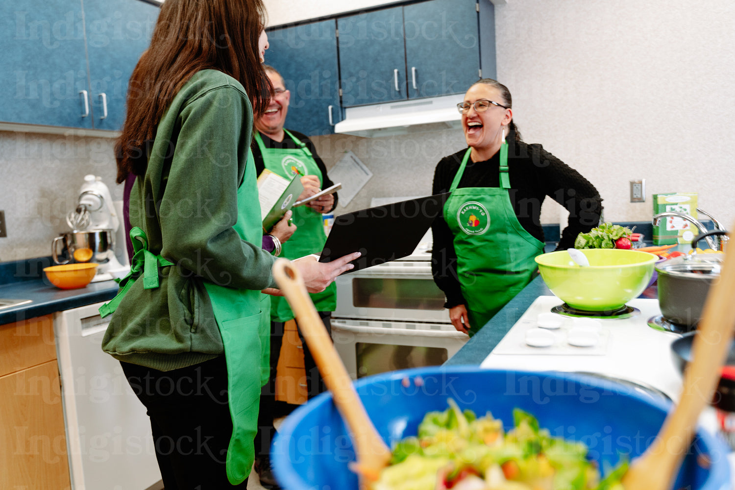 Indigenous Peoples making a meal together