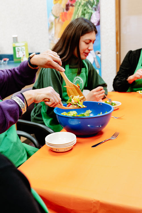 Indigenous Peoples sharing a meal together